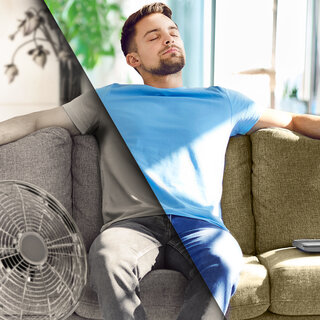 Zehnder_ALL_ExpReno_Overheating_Visual_01_250807_web Young man relaxing on couch enjoying fresh air of comfortable indoor climate