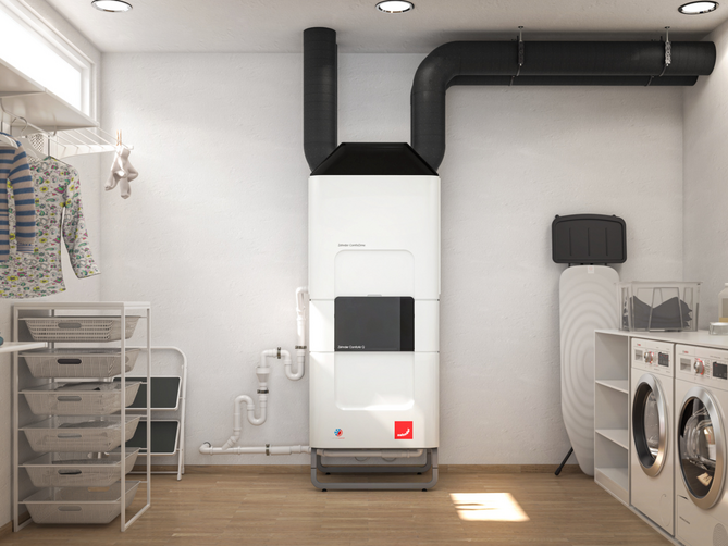 ComfoClime installato con apparecchio di ventilazione nel locale lavanderia