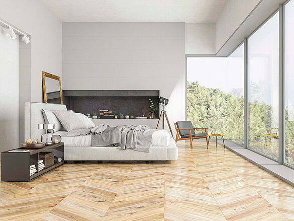 [Translate to Italiano:] Schlafzimmer mit Komfortlüftung im Sommer