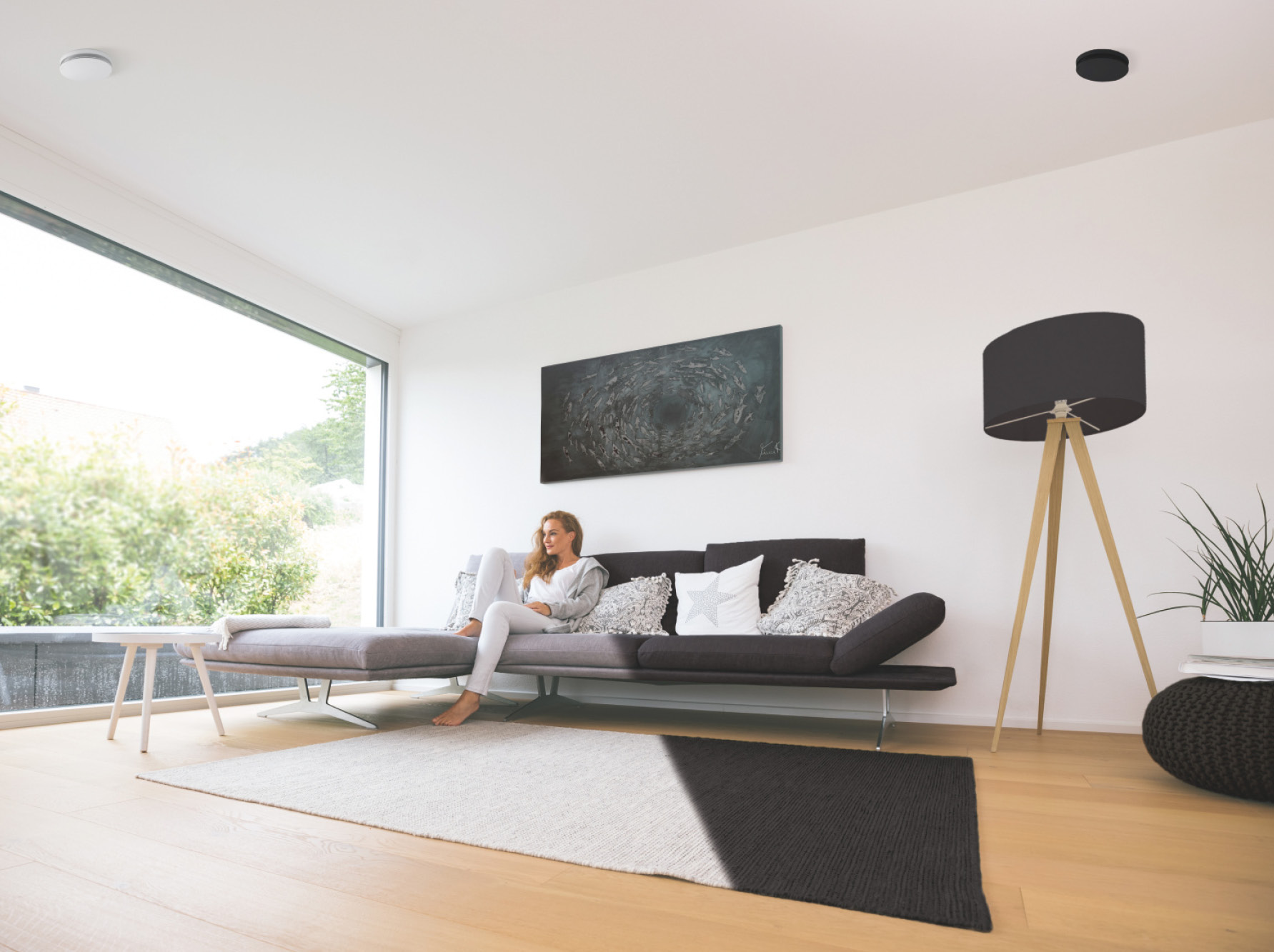 [Translate to Deutsch:] Wohnzimmer mit ComfoValve Luna E